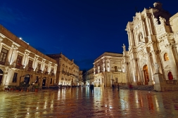 Piazza Duomo (Syracuse - Unesco World Heritage) during the blue hour. Few minutes before the shot, the plaza got wet becouse of the rain. it did not last long but the effect was incredible. The stones reflected all the colors from the natural and artificial lights.
